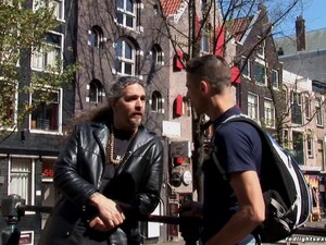 Guy With Tats Showers An Amsterdam Hooker With Cum