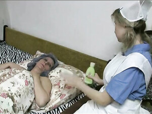 Cute Nurse In Lesbian Foreplay With Granny