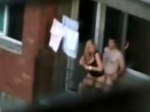Voyeur Captures The Neighbors Having Sex On The Balcony